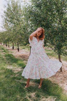 This flirty Take Me Back Dress is the perfect way to add some floral fun to your wardrobe. With a flattering V-neckline and playful ruffle details, you'll turn heads wherever you go. Don't miss out on this must-have piece. Details Floral pattern V-neckline Ruffle details Sizing Approximate measurements: SIZE LENGTH BUST Small 47" 38" Medium 48" 40" Large 49" 42" Fabric has no stretchModels are 5’10 wearing small Material 100% CottonHand wash coldHang to dry Take Me Back, Back Dress, Dress Backs, Dresses For Sale, Must Haves, Floral Pattern, Off White, Turn Ons, Wardrobe