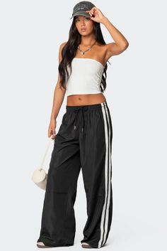 Fauna Nylon Track Pants – edikted Striped Sporty Bottoms For Sports, Sporty Striped Bottoms For Sports, Sporty Striped Sports Bottoms, Sports Bottoms With Side Stripes For Spring, Sporty Bottoms With Side Stripes For Spring, Sporty Summer Cargo Pants With Drawstring, Sporty Drawstring Trousers, Nylon Long Pants With Functional Drawstring, Striped Sportswear Bottoms For Sports