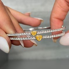 1.10 Carats Total 0.88 Carat Light Yellow Heart Shape Diamond 0.38 Carats of White Round Diamonds SI-VS1 Clarity Size 7 Wrist Crafted in 18k White & Yellow Gold Handmade in NYC White Gold Diamond Heart Bracelet For Anniversary, Anniversary Brilliant Cut Cuff Bracelet, Diamond Cut Diamond Cuff Bracelet For Anniversary, Hand Set White Gold Cuff Bracelet For Anniversary, White Gold Diamond Heart Bracelet, Anniversary White Gold Diamond Cuff Bracelet, 17 Jewels Bangle Diamond Bracelet For Anniversary, Luxury Heart Cut Tennis Bracelet, Anniversary Brilliant Cut Bangle Fine Jewelry