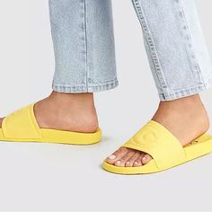 Elevate Your Summer Style With These Coach Ulla Slide Sandals For Women. The Buttercup Color Adds A Pop Of Brightness To Your Wardrobe, While The Rubber Upper Material Offers Durability And Comfort. These Sandals Feature A B Width, Perfect For Those With Regular Foot Arches. The Size 5 M Fits True To Size, And The Customized Option Is Not Available. The Coach Brand Ensures Quality And Style, Making These Sandals A Must-Have For Any Fashion-Forward Individual Coach Casual Slip-on Sandals, Coach Slide Sandals For Spring, Coach Synthetic Sandals For Spring, Coach Open Toe Sandals With Cushioned Footbed, Trendy Coach Open Toe Sandals, Trendy Coach Flat Sandals, Trendy Flat Coach Sandals, Coach Flat Sandals With Textured Footbed, Coach Slip-on Sandals With Textured Footbed