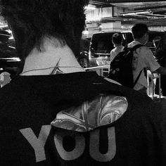 the back of a man's shirt that says you