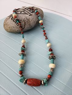 Turquoise and Jasper Beaded Necklace, Original, One of a kind jewelry design, Artist piece, Repurposed vintage Jewelry. I am a jewelry artist who designs and creates one of a kind, wearable art pieces made from repurposed vintage jewelry. Spending my college years in Arizona and living there for 12 years, I travelled throughout the state exploring its people and its beauty.  I am inspired by Native American art, and this necklace has a Southwestern theme.  I created this one of a kind, original design, necklace by repurposing vintage beads from a variety of jewelry pieces, from shops in Santa Fe, Phoenix and Sedona.   This necklace has a history filled with many stories from it's past. The Necklace has a very unique design using vintage beads of all shapes and sizes. Necklace colors are a Jewelry Artist, Vintage Beads, Unusual Jewelry, Repurposed Vintage, Jasper Beads, Native American Art, Artistic Jewelry, Sedona, All Shapes