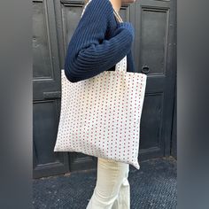 White Tote Bag With A Red Heart Print All Accessories Are Final Sale. Fabrics: 100% Cotton Measurement: 14" (35 Cm) Bag Length, 14" (35 Cm) Strap Length, 14" (35 Cm) Width Made In: China White Heart-shaped Shoulder Bag For Daily Use, Casual White Heart-shaped Bag, White Rectangular Bag With Heart Print, White Heart-shaped Everyday Bag, White Heart Print Bag As A Gift, White Heart Print Bag For Gifts, Brandy Melville Tote Bag, Red Heart-shaped Shopping Bag, Heart Tote Bag