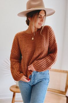 Details Made of a super soft, lofty yarn, this burnt orange sweater has a slightly cropped length and relaxed fit. It looks great with high-waisted denim or layered over a slip dress. Medium-weight knit Crew neckline Long sleeves Cropped length with relaxed fit Color: Pumpkin Gold Fabric + Fit 100% Polyester Hand wash cold. Fit is relaxed, we suggest taking your true size. XS (0-2), S (4-6), M (8-10), L (12) Imported Measurements Model is wearing a size Small Model Measurements: Height 5’8 | Bus Orange Sweater Outfit, Fall Family Outfits, Fall Knit Sweater, Burnt Orange Sweater, Fall Sweaters For Women, Fall Winter Jacket, Sweater Outfits Fall, Orange Fits, Teal Sweater