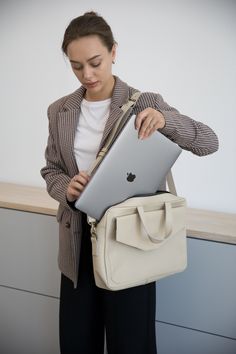 Introducing our women's leather laptop bag, the perfect blend of style and functionality. Designed specifically for women, this laptop tote bag is crafted from luxurious leather, allowing you to carry your laptop in utmost elegance.  Whether you're heading to the office or a business meeting, this leather laptop bag is a must-have accessory that combines practicality with timeless sophistication. Upgrade your professional look with our women's leather laptop bag today. Optionally, you can make c Luxury Briefcase For Business, Luxury Leather Briefcase For Gift, Large Capacity Leather Laptop Bag For Work, Office Tote Laptop Bag, Large Capacity Double Handle Laptop Bag For Work, Classic Laptop Bag With Double Handle For Everyday Use, Everyday Laptop Bag With Adjustable Strap And Double Handle, Classic Laptop Bag With Double Handle, Classic Double Handle Laptop Bag For Everyday Use