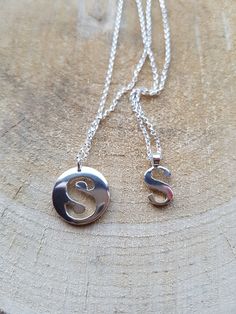 Letter S Necklace Letter Necklace Initial Necklace S Necklace Initial S Necklace Letter S Personalised Jewellery This is a listing of handmade sterling silver letter s necklace. The pendant is 21 mm in size ed in 16 or 18 inches sterling silver chain. Please see options. Necklace is available in letter s charm and the disc pedant. Item will come in a gift boxed. Similar item. https://www.etsy.com/uk/shop/flowerpecker?ref=seller-platform-mcnav&section_id=16084974 Mother's Day Silver Initial Pendant Necklace, Silver Initial Pendant Necklace Nickel Free, Silver Monogram Pendant Charm Necklace, Silver Initials Necklace For Everyday, Mother's Day Sterling Silver Initial Necklace With Round Pendant, Everyday Silver Necklaces With Initials, Silver Initials Pendant Necklace, Silver Initial Necklace With Round Pendant, Silver Initial Necklace With Round Pendant As Gift