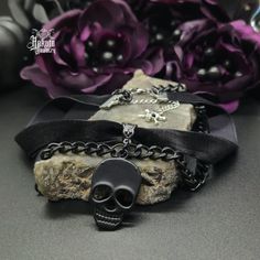 Embrace your Darker Side with this alluring Black Skull Layered Choker. Wear casual or dressy, whatever your heart desires. Add more Skulls to your look and pair with our Rings, Earrings, Bracelets, and Necklaces! Details: Fashion Jewelry ~ Handmade Diameter: 13 inches + 2 inch extender Skull charm: 35 x 22 mm Alternative Style Halloween Jewelry As A Gift, Edgy Jewelry For Halloween Gift, Punk Skull Jewelry For Halloween, Punk Style Skull Jewelry For Halloween, Gothic Jewelry With Skull Print For Gift, Alternative Style Jewelry For Halloween Party, Alternative Style Halloween Party Jewelry, Alternative Halloween Party Jewelry, Black Gothic Jewelry With Skull Print