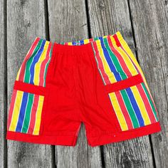 We offer FREE WORLDWIDE SHIPPING on all of our items. Please check measurements for most accurate fit. All measurements are done in inches and with item laying flat. Feel free to message with any questions.  Tag size: N/A Measurements in pictures  Flaws: N/A Retro Cotton Bottoms With Built-in Shorts, Retro Cotton Shorts With Elastic Waistband, Striped Cotton Shorts With Pockets, Retro Red Beach Shorts, Multicolor Cotton Bermuda Shorts, Red Bermuda Cotton Shorts, Red Cotton Bermuda Shorts, Red Short Cotton Pants, Retro Red Short Shorts