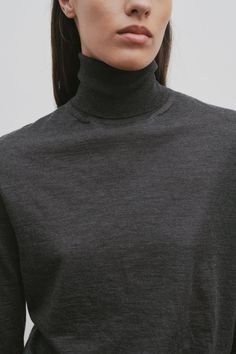 Eva Top in Cashmere $1,290 Luxury Long Sleeve Merino Wool Top, High Neck Fine Knit Merino Wool Sweater, Luxury Fine Knit Winter Tops, Fine Knit Merino Wool High Neck Top, Fine Knit High Neck Merino Wool Top, Cashmere Long Sleeve Turtleneck For Layering, Elegant Long Sleeve Wool Turtleneck, High Neck Fine Knit Merino Wool Turtleneck, High Neck Merino Wool Tops For Fall