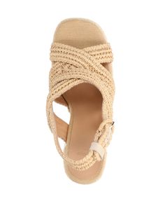 Castañer Adriana sandals in beige raffia with open round toe, back strap closure, and leather sole. Composition: 100% Raffia Elegant Slingback Sandals With Round Toe For Vacation, Elegant Round Toe Slingback Sandals For Vacation, Beige Woven Leather Sandals With Round Toe, Elegant Slingback Sandals With Buckle For Vacation, Elegant Wedge Sandals With Heel Strap For Vacation, Beige Closed Toe Woven Leather Sandals, Natural Woven Leather Sandals With Round Toe, Beige Closed Toe Sandals With Woven Leather, Beige Open Toe Slingback Sandals For Summer