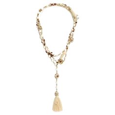 Long necklace or belt from the Chanel Métiers d'Art Paris Bombay collection (Pre fall 2012 - visible on the catwalk) composed of fancy pearls, enameled gold metal motifs in garnet to amber tones, others decorated with colored cabochons, CCs shaped and encrusted with colored pearls and enamel, ecru passementerie beads, ... all finished with a pretty pompom on one side and a carabiner on the other., signed. Total length 160 cm, dimensions of a CC 1.95 x 1.55 cm, diameter of the beads 0.8 cm. The n Colored Pearls, Diamond Drop Pendant, Vintage Chanel Bag, String Necklace, Chanel Box, Chanel Necklace, Chanel Pearls, Modern Necklaces, Diamond Drops