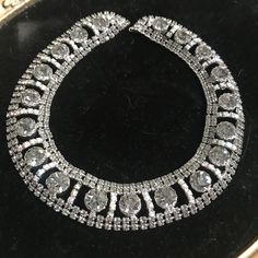 Couture Large Rhinestone Necklace, high end collectible, Choker necklace, Vintage collectible, costume jewelry Rhinestone statement necklace in very good vintage condition.  Measures 15 1/2 inches long by almost 1 inch wide.  Very pretty collectible piece. Perfect for any wardrobe. Nice looking on. ps22 Glamorous Round Necklace With Sparkling Stones, Party Bridal Necklace With 17 Jewels And Crystal, Dazzling Rhinestone Necklace, Costume Jewelry Choker With Bling, Costume Jewelry Bling Choker, Costume Choker Jewelry With Bling, Evening Rhinestone Necklace With Jewels, Glamorous Round Rhinestone Necklaces, Bling Crystal Costume Necklaces