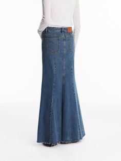 MO&Co. Women's Denim Mermaid Maxi Skirt This denim maxi skirt is made from premium cotton. It's detailed with vertical seams that create a paneled effect and has an exaggerated flared hem. Wear it with a simple top for a chic look. Features : - Flared maxi silhouette- Button and zip closure- Five-pocket design Code: MBD3SKTT06The back length of size S is 98cmMATERIALS & CARE Material: 100% CottonPlease put it into a mesh bag to wash.Denim products have slight fading, which is normal.REMINDER: Al Madewell Fall, Mermaid Maxi Skirt, Simple Top, Denim Maxi, Denim Maxi Skirt, Mesh Bag, Chic Look, Pocket Design, Denim Women