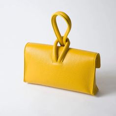 Bold and beautiful, this striking clutch is elegant and simple and has been our most popular bag this season! Comes with a removable crossbody strap. Find the color that fits you best and feel stylish and prepared for anything! Italian leather is the most recognizable leather in the entire world because of its unique characteristics including a vibrant color palette. The finest quality Italian leather, including vegetable tanned leather comes from Tuscany, the heart of Italy. Leather craftsmansh Versatile Clutch Box Bag With Detachable Strap, Modern Crossbody Clutch With Removable Pouch, Versatile Clutch Box Bag With Adjustable Strap, Versatile Box Bag Clutch With Adjustable Strap, Versatile Clutch With Detachable Strap In Satchel Shape, Versatile Box Clutch With Adjustable Strap, Minimalist Clutch Shoulder Bag With Detachable Strap, Modern Clutch With Detachable Strap For Crossbody, Versatile Leather Crossbody Clutch