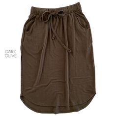 The cutest tulip hem skirts are here! Featuring an elastic waistband and pockets, these skirts are an easy transition from casual days to dressing up for nights. Approx. Total Body Length (Front including Band): 24" Fabric Content: 57% Polyester 38% rayon 5% spandex Casual Solid Color Relaxed Mini Skirt, Solid Skirt With Elastic Waistband For Day Out, Casual Loungewear Skirt With Pockets, Casual Solid Color Mini Skirt With Relaxed Fit, Relaxed Solid Skirt For Loungewear, Casual Solid Color Pencil Skirt, Casual Solid Color Skirt For Loungewear, Solid Color Flowy Skirt With Banded Waist, Relaxed Mini Skirt With Elastic Waistband For Fall