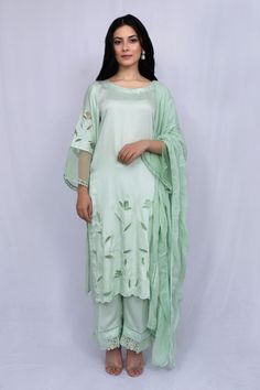 Mint green kurta with floral cutwork and sheer sleeve hem detailing. Paired with tonal pant and kota dupatta.
Component: 3
Type Of Work: Floral
Neckline: Round
Sleeve Type: Full sleeves
Fabric: Modal Satin, Kota, Organza
Color: Green
Other Details: 
Sheer sleeve hem
Nalki work or neckline
Scallop hem on kurta
Occasion: Puja - Aza Fashions Floral Cutwork, Kurta Set For Women, Scallop Hem, Fashion App, Kurta Set, Full Sleeves, Scalloped Hem, Cut Work, Sheer Sleeves