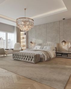 a large bedroom with a chandelier hanging from the ceiling and carpeted flooring