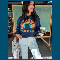 This amazing Teacher Life Rainbow Sweatshirt is made with breathable material to offer you a cozy comfort all day long. The beautiful rainbow colors make it so stylish, while the pullover style makes for easy wear. Pair it with anything from denim to drawstring joggers and sneakers for a relaxed vibe. Trendy Multicolor Relaxed Fit Sweatshirt, Trendy Multicolor Cotton Sweatshirt, Casual Rainbow Relaxed Fit Top, Casual Rainbow Print Relaxed Fit Top, Casual Relaxed Fit Rainbow Print Tops, Casual Rainbow Print Top With Relaxed Fit, Trendy Relaxed Fit Tops With Rainbow Print, Relaxed Fit Trendy Top With Rainbow Print, Trendy Relaxed Fit Top With Rainbow Print