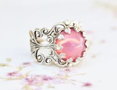 Vintage Pink Opal RingPink Glass OpalSTURDY by hangingbyathread1 Adjustable Pink Opal Ring As A Gift, Handmade Vintage Pink Rings, Adjustable Pink Opal Ring, Adjustable Pink Round Opal Ring, Adjustable Vintage Cabochon Moonstone Ring, Bohemian Pink Wedding Rings, Vintage Pink Cabochon Ring, Vintage Handmade Opal Wedding Ring, Vintage Adjustable Moonstone Wedding Ring