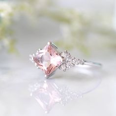 Elegant Princess Cut Morganite Ring ►Made of solid sterling silver with rhodium finish (925) ►Accented With Simulated Diamonds (CZ) ►Average band width: 1.8 mm Center Stone: Morganite Gemstone Creation: Lab-Created Shape: Princess Size: 6.0 mm Carat Weight: 1.24 ✓ 100% Nickel-Free ✓ Hypoallergenic ✓ Comfort Fit ✓ Free Ring Box ✓ Free USA Shipping Pink Gemstone Engagement Rings, Etsy Engagement Rings, Sterling Silver Engagement Rings, Morganite Ring, Pink Gemstones, Solid Gold Jewelry, Pink Ring, Fine Jewelry Collection, Womens Engagement Rings