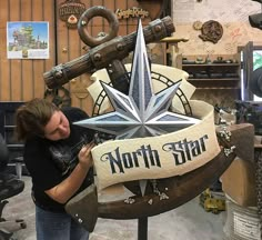 a woman is working on a star sign