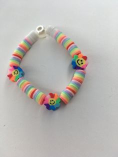 Cute rainbow waterfall bracelet, perfect for anything and comes with : Jewelry bag, sticker, and product:) Trendy Beaded Rainbow Friendship Bracelets, Playful Multicolor Friendship Bracelets, Rainbow Plastic Beaded Bracelets As Gift, Fun Rainbow Friendship Bracelets As Gift, Fun Rainbow Friendship Bracelets As Gifts, Fun Adjustable Rainbow Beaded Bracelets, Adjustable Rainbow Beaded Bracelet For Fun, Fun Rainbow Plastic Jewelry, Trendy Rainbow Beaded Bracelets