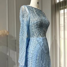 a dress on display in front of a window