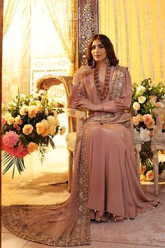 Buy Pakistani Wedding Dress in Angrakha and Sharara Style, an elegant attire adorned with hand-crafted embellishments and luxury designs. Fast shipping. Elegant Floor-length Wedding Dress For Eid, Anarkali Hand Embellished Gown For Wedding, Eid Wedding Dress Hand Embellished Semi-stitched, Hand Embellished Floor-length Wedding Gown, Floor-length Wedding Dress For Eid, Eid Hand Embellished Semi-stitched Wedding Dress, Eid Reception Hand-embellished Wedding Dress, Hand Embellished Wedding Dress For Eid Reception, Elegant Wedding Dress For Eid Reception