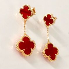 New. 2 Quatrefoil Clover Motif With Both Sides Red Carnelian Enamel Color. 18k Yellow Gold Plated On Stainless Steel High Quality . Water Resistant. Does Not Tarnish. Vintage Style Stud Drop Earrings Perfect For Everyday Wear If You Love Fashion Luxury. Unisex. Earrings, 2 Quatrefoil Clover Motifs, 18k Yellow Gold Plated, Carnelian Red Color Enamel . Length: 2 Inches. Formal Red Flower-shaped Earrings, Luxury Red Pierced Jewelry, Luxury Red Dangle Jewelry, Luxury Red 14k Gold Earrings, Luxury 14k Gold Red Earrings, Red Flower Shaped Jewelry For Formal Occasions, Red Flower Shaped Formal Jewelry, Elegant Red Flower-shaped Jewelry, Luxury Red Flower Shaped Jewelry