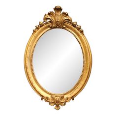 an ornate gold framed mirror against a white background