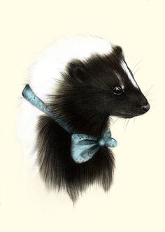 an animal with a bow tie on it's neck