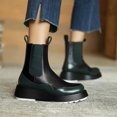 Step out in style with the Patricia Boots. The classic Chelsea boot reimagined with an oversized platform, the boot has a clean and minimalistic design, made of super soft leather, featuring a round toe, front and back tongue, and elasticated panels that make them so easy to pull on and off finished with slip & abrasion-resistant rubber sole. Wear them with jeans or floaty dresses. 100% Leather Mid-calf boots Imported Leather Chelsea Boots With Contrast Sole, Leather High-top Mid-calf Platform Boots, Modern Ankle-high Platform Boots For Work, Faux Leather Platform Boots With Lug Sole, Winter Workwear Platform Boots With Lug Sole, Leather Platform Mid-calf Boots, High-top Chelsea Boots With Contrast Sole, High-top Leather Chelsea Boots With Contrast Sole, High-top Faux Leather Boots With Lug Sole