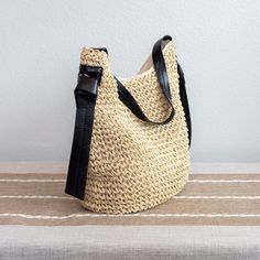 New style! Straw woven shoulder bag perfect for all occasions. This bag provides a unique combination of style, convenience, and durability. It's an ideal choice for days out, special events, and everyday wear. Magnetic button closure. Fully lined with inner pocket. Dimensions: 11"H x 14"W x 6"D 10" handle drop Designer Style ID: 8456 Chic Everyday Handwoven Hobo Bag, Versatile Crochet Bag With Adjustable Strap For Everyday Use, Eco-friendly Bucket Bag With Braided Handles, Versatile Natural Straw Shoulder Bag, Chic Handwoven Hobo Bag For Everyday, Casual Woven Leather Hobo Shoulder Bag, Versatile Straw Bag With Braided Handles For Daily Use, Trendy Woven Crochet Shoulder Bag, Trendy Handwoven Straw Shoulder Bag