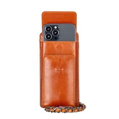 an iphone case is shown with the phone in it's holder and chain on the side