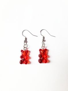 "Red Gummy Bear Earrings * These cute and fun earrings are perfect for anyone who loves sweet treats and unique accessories. ♥ Handmade with love by Lucy, a twelve year old, homeschooler ♥ Gummy Bear Details Length: 15/16\" Width: 7/16\" Nickel Free" Fun Red Resin Earrings, Red Resin Novelty Earrings, Fun Style Red Resin Earrings, Novelty Red Resin Jewelry, Red Resin Novelty Jewelry, Handmade Red Kawaii Jewelry, Fun Red Resin Jewelry, Trendy Red Earrings For Birthday, Playful Nickel-free Red Earrings