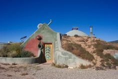 an image of a house that is in the desert