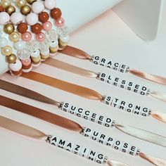 Set of two beautiful coordinating bracelets in tones of pinks/peaches/gold/tans/crystals.  One bracelet has beads with an inspirational word strung on satin ribbon and has an option of a permanent tie closure or instructions for it to be adjustable by adding an enclosed bead. Each bracelet Measures 18" long and can be trimmed to the size needed.  The second bracelet is a beautiful matching 7" strand of metal and wood beads strung on durable elastic cord. PACKAGING: All items are packaged with care on my branded card and placed into a beautiful sheer white organza drawstring pouch and wrapped in tissue paper. Perfect right out of the mail and given as a gift! SHIPPING: All orders shipped same day or next day (except during weekends and holidays) By making a purchase from Riding on Inspirati Inspirational Pink Beaded Jewelry, Pink Adjustable Bracelets For Bridesmaids, Beaded Rose Gold Bracelets As Gift, Rose Gold Beaded Bracelets For Gifts, Rose Gold Beaded Bracelet For Gift, Adjustable Rose Gold Beaded Bracelet With Letter Beads, Adjustable Rose Gold Beaded Bracelet, Rose Gold Beaded Bracelets For Friendship, Adjustable Gold Crystal Bracelet For Bridesmaids