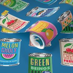 an image of canned food items on a blue background with watermelon and cherries