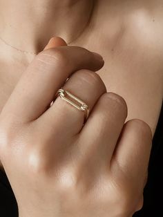 Elevate your accessory game with this 14K Solid Gold Paperclip Ring. This minimalist design features a sleek Yellow Gold link ring, perfect for adding a touch of elegance to any outfit. The rectangular shape of the jewelry makes it unique and versatile, making it an ideal choice for a birthday, Mother's Day, or wedding gift.  ✪ Handmade / Handcrafted Fine Jewelry  ✪ Gold Weight: Approx. 2,23g (Based on size 6)  ✪ Metal:  14K Solid Gold   ✪ Band Width:   ✪ Gold Color: White gold, Rose gold, Yello Paperclip Ring, Ring Rectangle, Link Ring, Linking Rings, Gold Link, Jewelry Birthday, Ring Minimalist, Minimalist Ring, Minimalist Rings