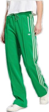 Adidas Sportswear Pants For Spring, Casual Cotton Bottoms With Adidas Logo, Casual Adidas Cotton Bottoms, Sporty Adidas Logo Pants, Adidas Sporty Sweatpants For Spring, Casual Adidas Cotton Bottoms With Logo, Green Sportswear Bottoms With Three Stripes, Casual Green Bottoms With Three Stripes, Adidas Green Bottoms For Streetwear