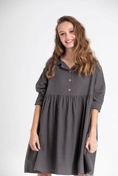 ‘A Week in Provence ‘ is the Miss Rose Sister Violet Spring / fall 2018 new clothing range and this gorgeous dress in heavy soft cotton is great to wear as either a top or dress .In two sizes S/mM/l Loose and so well made , it needs little ironing ( if any ) and is wash and wear easy to look after !! We wear it with our silky lace edged slip . Available in rose blush and charcoal . Fall Cotton Shirt Dress With Short Sleeves, Cotton Short Sleeve Shirt Dress For Fall, Fall Shirt Dress With Rolled Sleeves For Daywear, Fall Cotton Washed Dress, Cotton Button-up Dress With Rolled Sleeves, Button-up Cotton Dresses With Rolled Sleeves, Spring Cotton Tunic Shirt Dress, Spring Cotton Dresses With Rolled Sleeves, Fall Cotton Tunic Shirt Dress