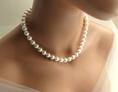 This trendy large pearl necklace is handmade in your choice of vegan white or ivory/cream 10mm pearls. The necklace includes a 3 inch silver figaro chain extension, embellished with a pearl drop, for adjustable sizing. ♥ All jewelry comes in a gift box and is ready to give! ♥ Want to see similar items? There are many more unique items at my shop, including children's jewelry! Back to main shop: http://etsy.me/29ztspj Real Pearl Necklace Vintage, Pearls Backdrop, Ball Jewellery, Large Pearl Necklace, Charm Bracelets For Girls, Silver Figaro Chain, Chunky Pearl Necklace, Backdrop Necklace, Children's Jewelry