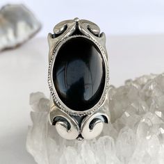 Large onyx ring sterling silver, black gemstone ring goth ring Black crystal ring made in Armenia gifts for women Handmade silver ring with natural black onyx. The ring is large and has a unique look! The free size of this ring lets you give a gift without knowing the size of finger) Also, All our pieces have the perfect design, modern look, and best quality ▶Ring weight: 18.53 gr ▶Length: 45 mm ▶Width: 25 mm All our jewelry is made of high-quality sterling silver and is stamped with a 925 stamp Gothic Sterling Silver Crystal Ring As Gift, Gothic Sterling Silver Crystal Ring For Gift, Oval Gemstone Gothic Jewelry, Gothic Oval Gemstone Jewelry, Oval Gothic Gemstone Jewelry, Gothic Silver Crystal Ring With Gemstone, Gothic Style Silver Ring With Gemstone, Gothic Silver Ring With Gemstone, Silver Gothic Gemstone Jewelry