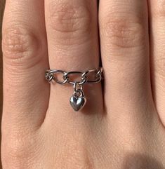 This is a unique ring that I designed and put together by hand! It is a silver-colored chain with a small dangle heart charm. To preserve the color, I do not recommend contact with water! Please message me if you have any questions or customizations that you would like! Chain Heart, Charm Ring, Star Chain, Charm Rings, Unique Ring, Anklet Jewelry, Chain Ring, Perfect Ring, Stackable Rings