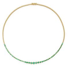 An updated take on a timeless piece, our Graduated Emerald Tennis Necklace is handcrafted in 18-karat yellow gold and set with 2.75 carats of round, brilliant cut emeralds in varying size - with the largest stones set in the center and gradually get smaller until they meet the plain, polished gold bezels that comprise Elegant Hand-set Emerald Necklace In Yellow Gold, Elegant Yellow Gold Hand Set Emerald Necklace, Luxury Hand Set Round Emerald Necklace, Luxury Hand-set Round Emerald Necklace, Hand Set Round Emerald Necklace In Fine Jewelry Style, Hand-set Round Emerald Necklace In Fine Jewelry Style, Hand-set Round Emerald Necklace, Luxury Emerald Necklace With Brilliant Cut, Elegant Brilliant Cut Emerald Necklace In Yellow Gold