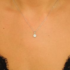 Explore our Illusion Diamond Necklace, a captivating piece that emanates the hidden fragrance of nature, making it a must-have accessory in your collection.   Diamond Specifications: * Type: Natural, Genuine Diamonds (Ethically Mined) * Color: D-F (whitest level of white Diamonds) * Clarity: VS/VVS (Microscopically clean) * Total Weight: 0.30 Ct * Number of Stones: 7 Natural Diamonds * Shape: Round Brilliant * Cut: Excellent * Setting Type: Prong Setting  Gold specifications: *Caliber: Solid 18K Dainty Diamond White Flower Pendant Jewelry, Dainty Diamond Cut Flower Pendant Jewelry, Elegant White Gold Flower Charm Necklace, Elegant White Gold Flower Necklace, Minimalist Flower-shaped Formal Jewelry, Delicate Diamond Necklace With Flower Charm, Delicate Diamond White Flower-shaped Jewelry, Dainty White Necklace With Brilliant Cut, Brilliant Cut Flower Pendant Jewelry