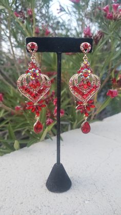 Red Glamorous Chandelier Earrings For Party, Glamorous Red Chandelier Earrings For Party, Red Glamorous Chandelier Earrings For Evening, Glamorous Red Chandelier Earrings For Evening, Glamorous Red Crystal Earrings For Evening, Red Crystal Earrings For Valentine's Day Party, Red Crystal Rhinestone Earrings For Party, Red Rhinestone Crystal Earrings For Party, Glamorous Red Crystal Earrings For Party