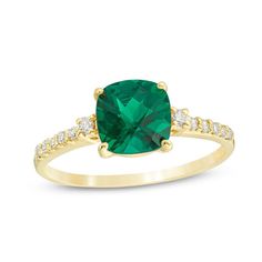 A colorful way to show your love, this engagement ring is the start of something beautiful. Crafted in warm 10K gold, this adventurous style features a 7.0mm cushion-cut lab-created verdant-green emerald flanked by a pair of sparkling diamonds. Dainty diamonds line the shank for the perfect touch of shimmer. Radiant with 1/8 ct. t.w. of diamonds and a brilliant buffed luster, this engagement ring is a unique choice to celebrate your romance. Halo Engagement Ring Wedding Band, Emerald Cut Engagement Ring, Verdant Green, Engagement Rings Vintage Halo, Emerald Cut Engagement, Gold Diamond Wedding Band, Lab Created Emerald, Diamond Engagement Rings Vintage, Engagement Ring Diamond Cut