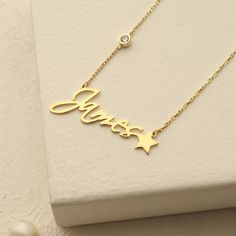 Looking for the perfect way to celebrate a special someone's birthday? Look no further than our Birthstone Name Necklace - the ultimate personalized gift that combines elegance, sentimentality, and style. The birthstone adds an extra touch of elegance and personalization, making it a truly special gift that your loved one will cherish forever. Whether you choose their birthstone or a stone that holds special meaning to them, this necklace is a beautiful and thoughtful way to show how much you ca Elegant Personalized Stainless Steel Charm Necklaces, Dainty Sterling Silver Name Necklace With Birthstone, Elegant Stainless Steel Custom Name Necklace, Elegant Personalized Stainless Steel Name Necklace, Elegant Stainless Steel Name Necklace As Personalized Gift, Elegant Stainless Steel Name Necklace For Personalized Gift, Personalized Elegant Stainless Steel Name Necklace, Elegant Engraved Necklace For May Birthstone, Silver Birthstone Nameplate Necklace