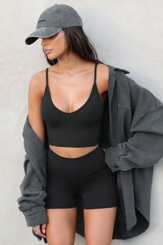 Spaghetti strap cropped tank with a u-neckline. Our FlexRib fabric was designed with comfort in mind. It's soft, stretchy and made to move with you. You'll want to wear it all day, everyday. Color: ﻿Vintage Black FlexRib Sizing: X/S (0-2), S/M (4-6), M/L (8-10) Model is 5'8" and wearing size X/S Fabric: 90% Rayon, 10% Spandex Care: Machine Wash Cold With Like Colors. Care: Lay Flat to Dry. Made in Los Angeles